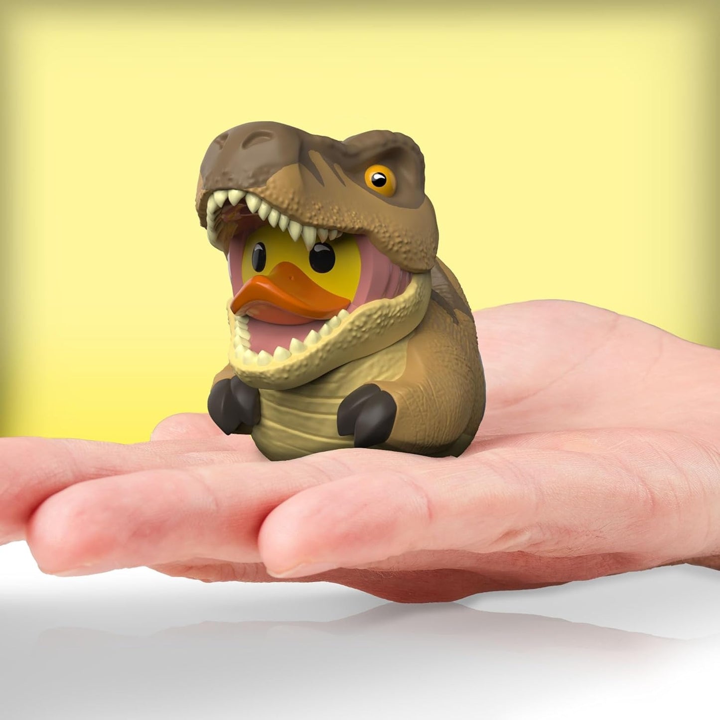 Pato de goma coleccionable disfrazado de T.Rex Jurassic Park - Edición Mini