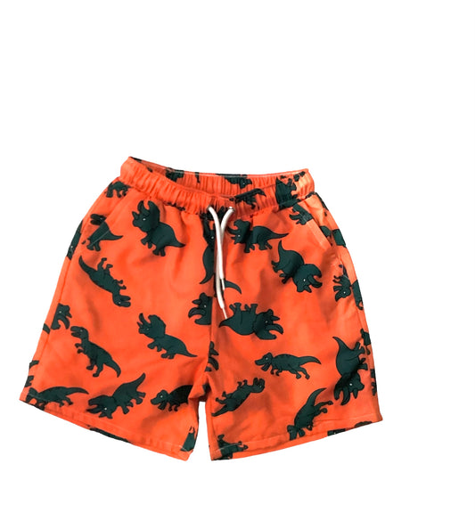 Pantaloneta naranja con dinos verdes