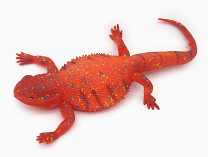 Reptil anaranjado estirable